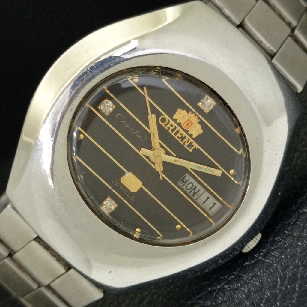 Vintage 1976 Orient Automatic Mens Silver Watch WDaydate  Gold Accents